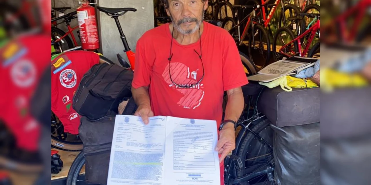 Ciclista que viaja o mundo é assaltado em PG e pede ajuda para conseguir novo celular