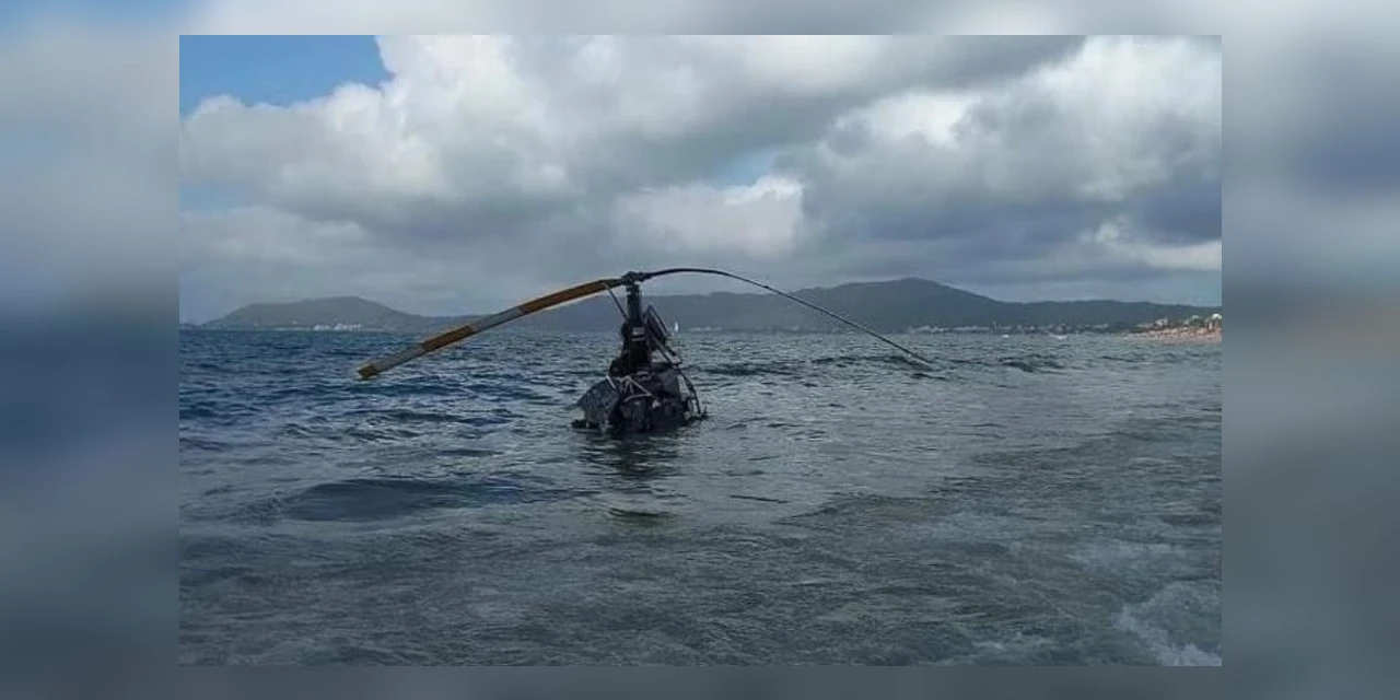 Helicóptero cai no mar em praia de Florianópolis