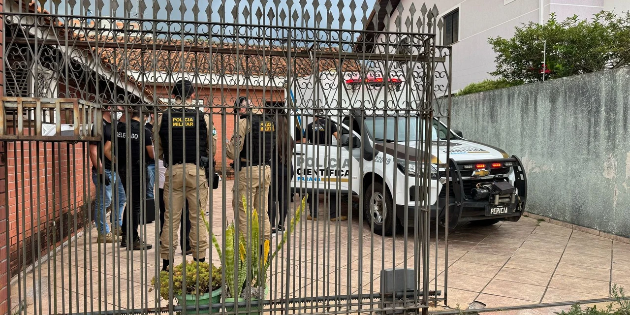Carta estava sendo escrita onde pai e filho foram achados mortos em PG